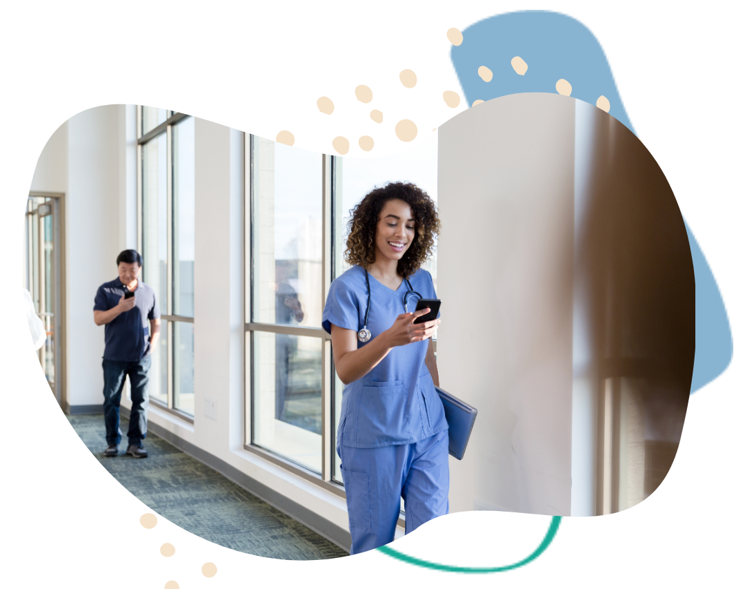 Healthcare professional walking through a hospital corridor with natural light Arizona provider walking through a hospital after receiving mental health support from SafeHaven